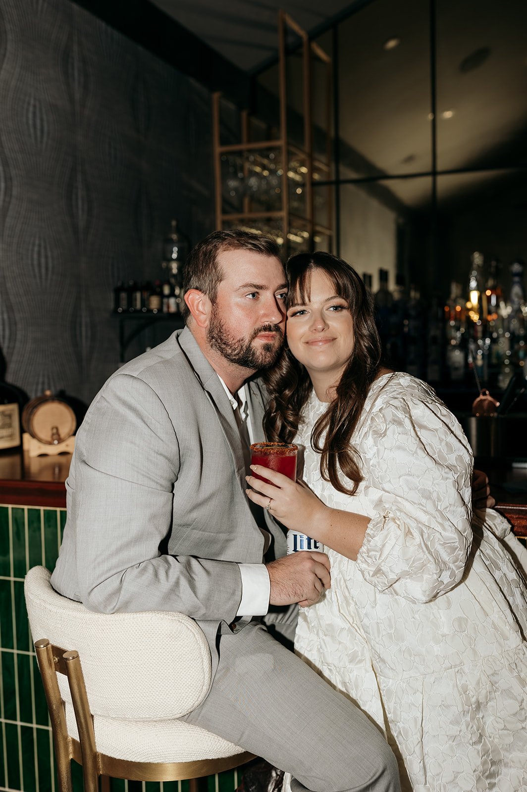 The couple switched up their more rugged outfits for cocktail hour engagement photos