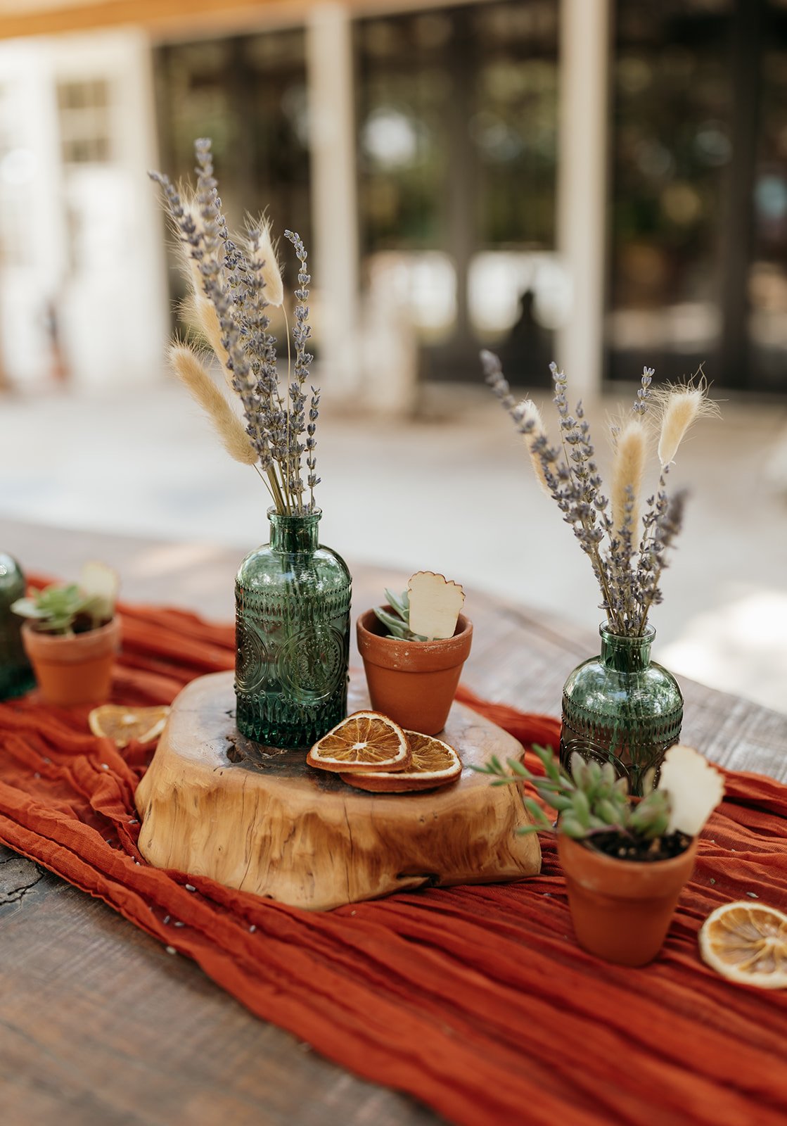 Autumn and rust-colored intimate wedding decor at Baron's Creek Camp