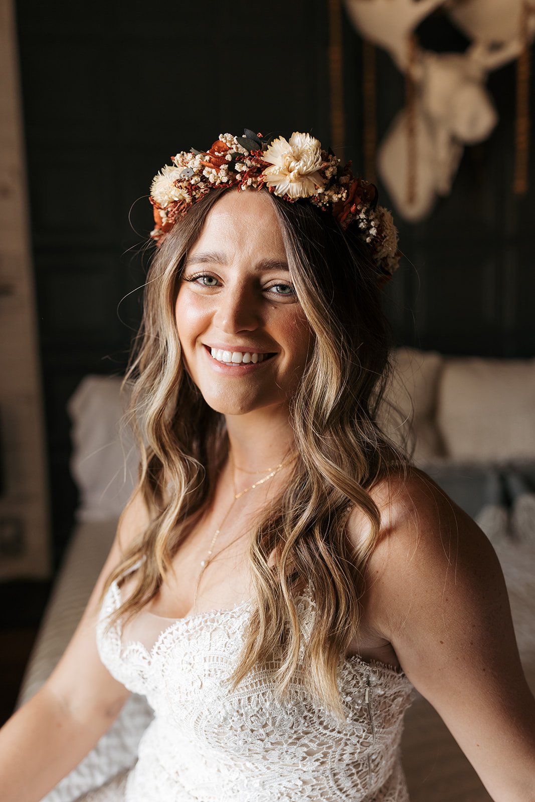 Perfect for her intimate fall wedding, Leah wears a dried flower crown with her soft curls