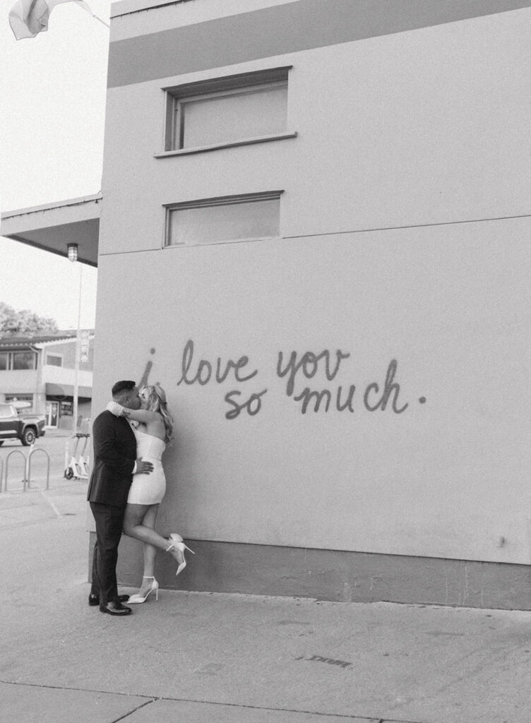 Jo's Coffee I love you so much mural engagement photos on South Congress Avenue