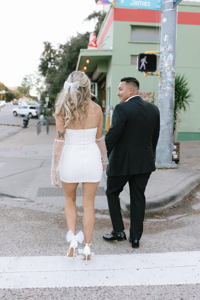 Walking the crosswalks of downtown Austin for their elegant city engagement session