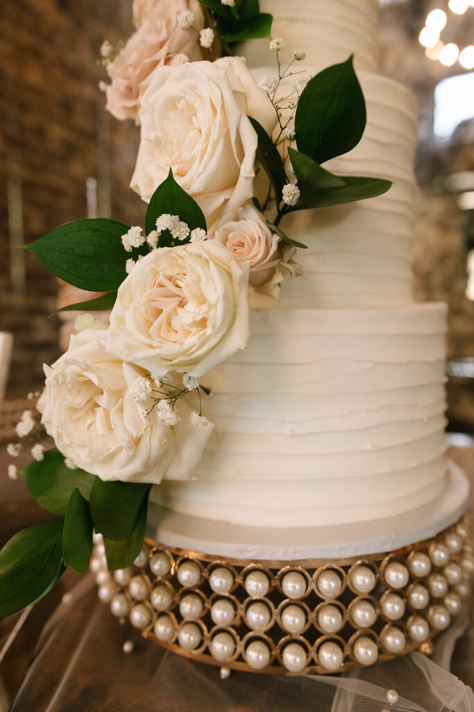 Elegant white wedding cake with stand