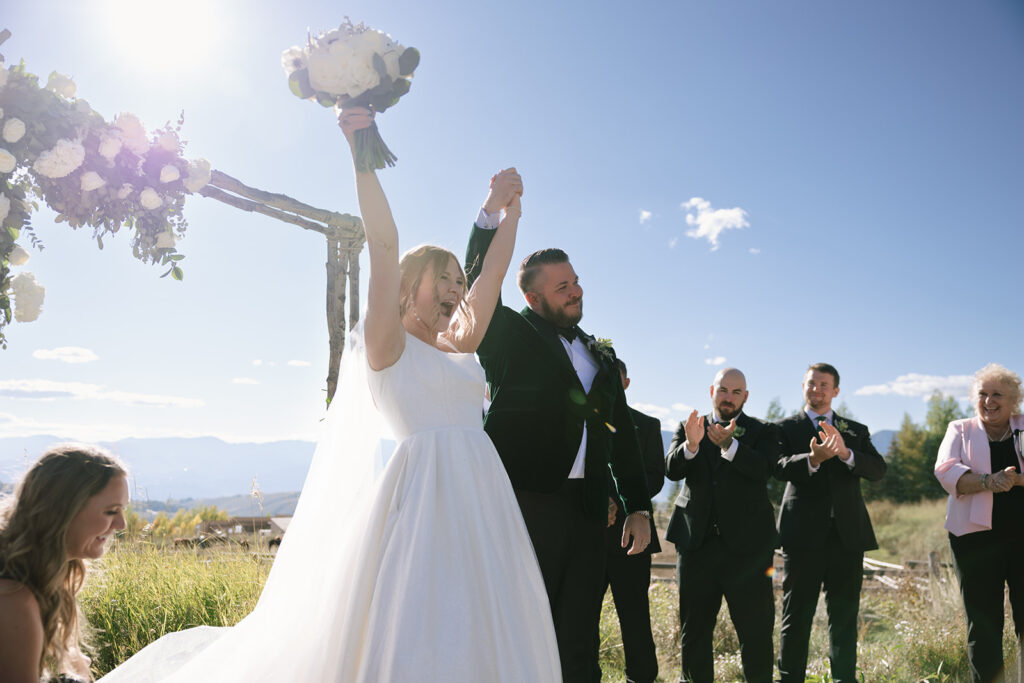 Announcing the new husband and wife at the epic Spring Creek Ranch wedding in Jackson Hole Wyoming