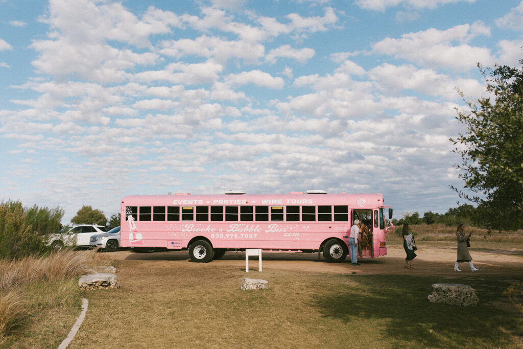 Brookes Bubble Bus shuttling guests to the Bluff ceremony site for their Contigo Ranch outdoor wedding