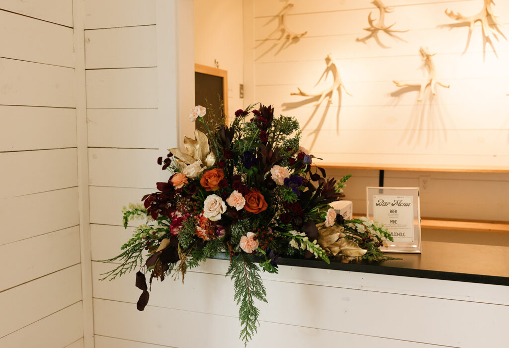 Elegant, modern western wedding reception flowers and decor