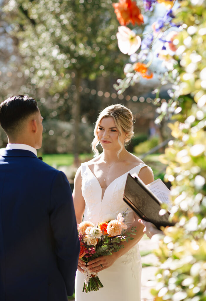 Stunning garden vibes and sunshine during their wedding ceremony at Hummingbird House Austin