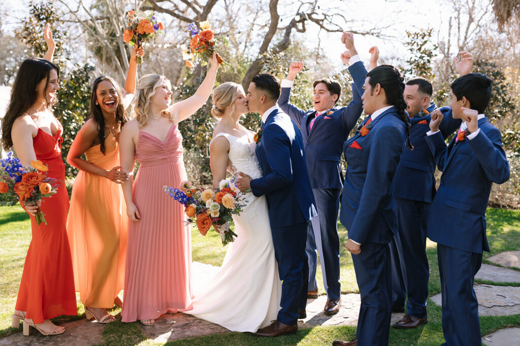 All the sunshine, vibrant color and celebrating during wedding portraits at Hummingbird House Austin