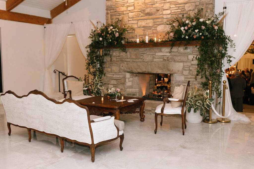 Romantic winter wedding reception area by the Videre Estate's fireplace