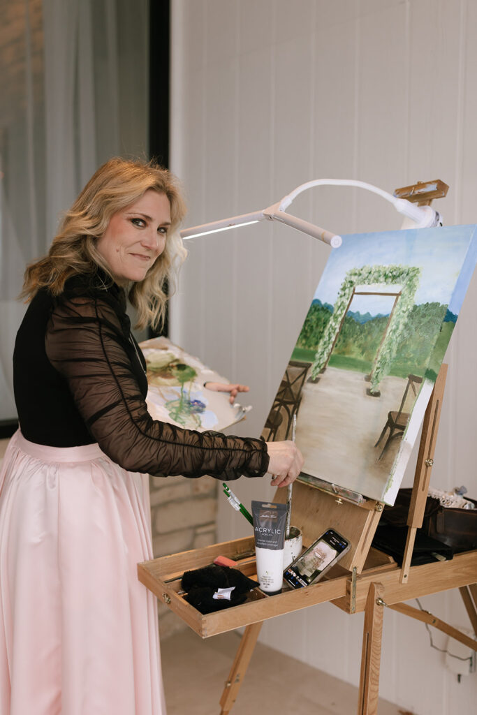 Their live wedding painter Camille painting the ceremony as it unfolds