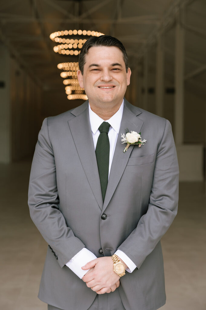 Portraits of the groom in the stunning remodeled stables of The Videre Estate