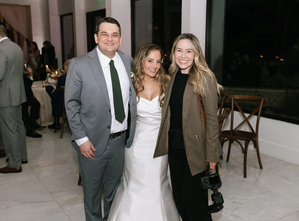 Photo of Kari Creative Photography with Lara and Jordan during the wedding reception